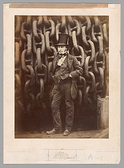 Isambard Kingdom Brunel against the launching chains of the SS Great Eastern at Millwall in 1857, photo by Robert Howlett (1831–1858). Photo from https://commons.wikimedia.org/wiki/File:-Isambard_Kingdom_Brunel_Standing_Before_the_Launching_Chains_of_the_Great_Eastern-_MET_DP-510-026.jpg